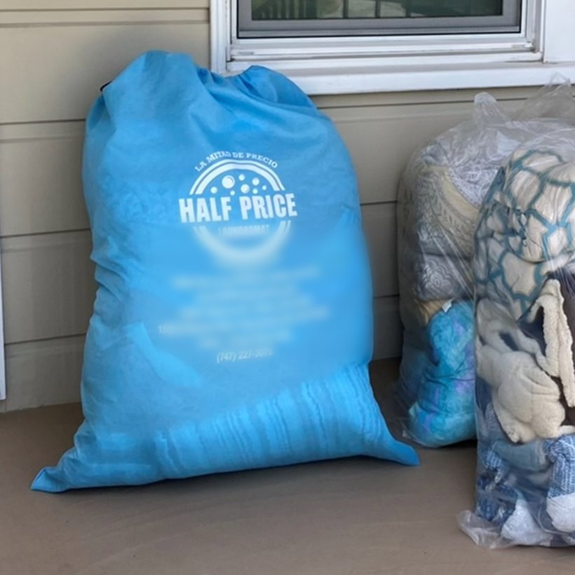 Half Price Laundry bag and finished laundry delivered to a residence doorstep